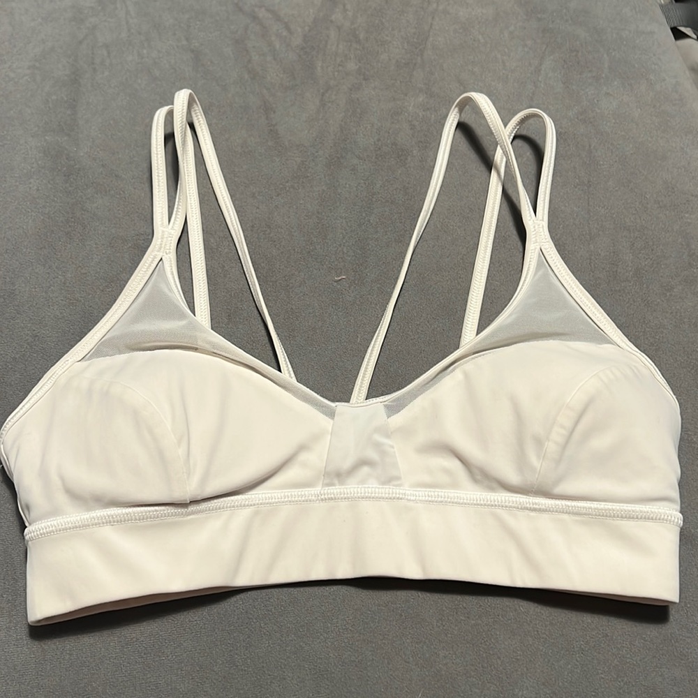 White strappy back sports bra with mesh